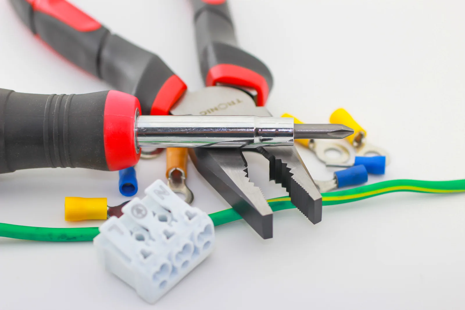 Pliers, a screwdriver, ferrules and a connector block, for electrician in Hartford