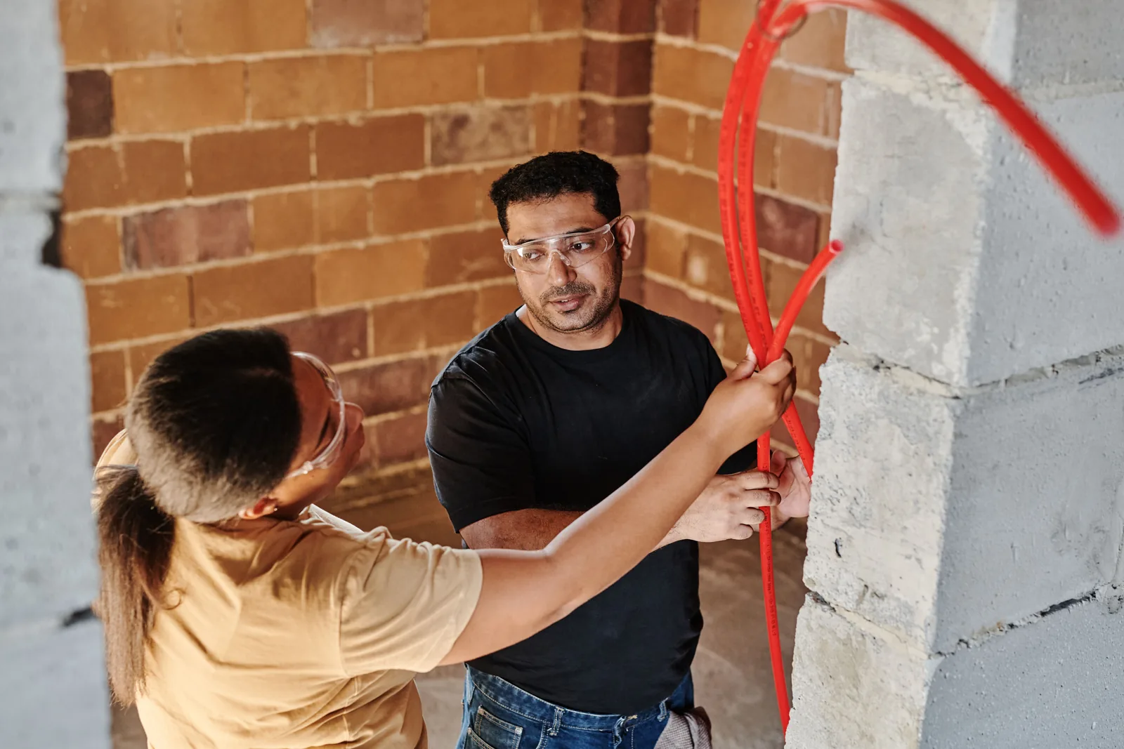 Running conduit across a block wall, for ev rebate in Hartford